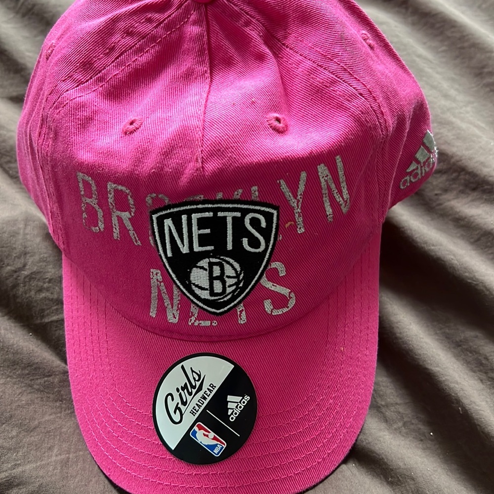 Pink Brooklyn Nets hat.  Girls size 7 to 16.  Adjustable at the back. Adidas.